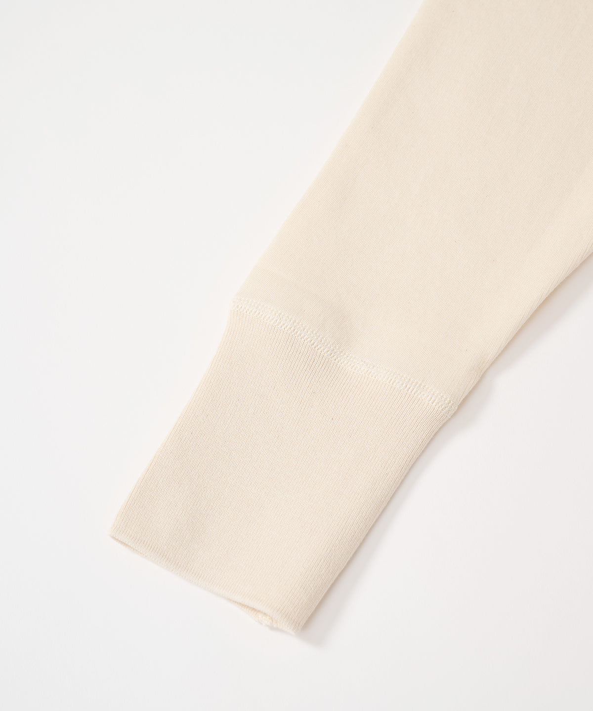 パンケーキニット長袖クルーネック