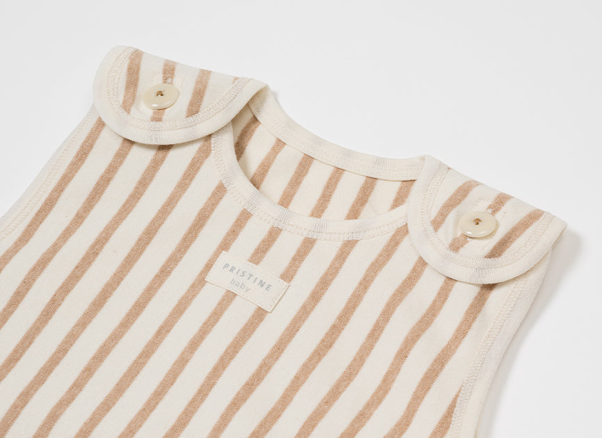 赤ちゃんの睡眠を守る「着る布団」